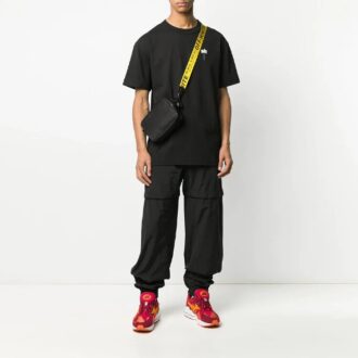 Pantaloni lungi de sport Arrows Bundle Feet, croială largă, negru Pantaloni lungi de sport Arrows Bundle Feet, croială largă, negru