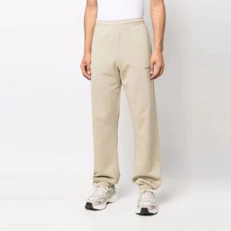 Pantaloni sport/pantaloni/joggers pentru bărbați Off-White FW22 din twill cu imprimeu, croi larg, bej Pantaloni sport/pantaloni/joggers pentru bărbați Off-White FW22 din twill cu imprimeu, croi larg, bej